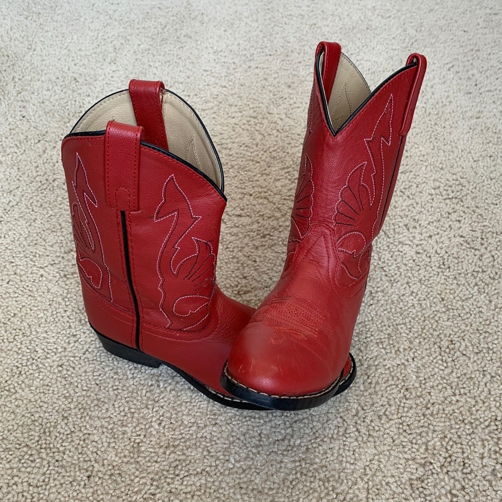 Red cowgirl boots with white and black detailing